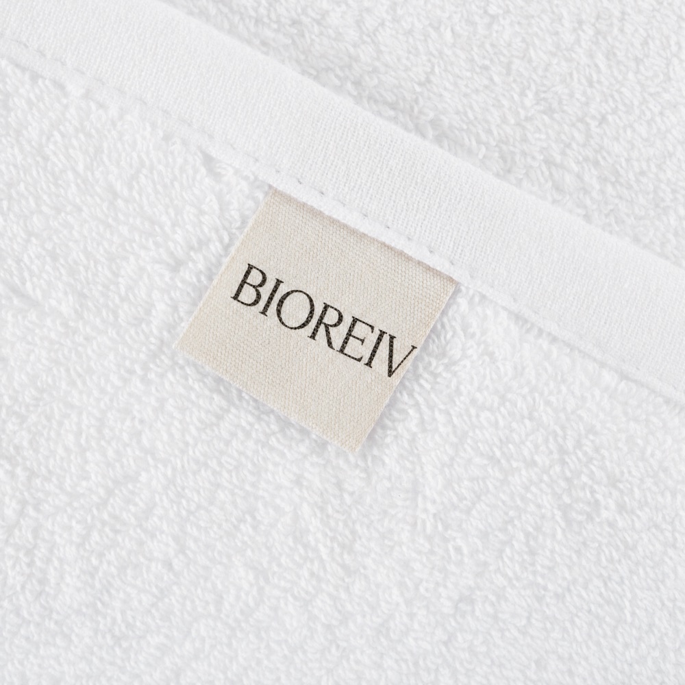 Close up of the Bioreiv woven label on white cotton terry